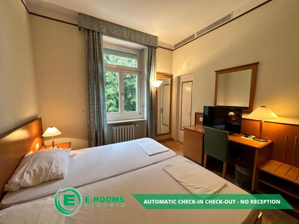 E-Rooms Minusio : photo 1 de la chambre chambre lits jumeaux