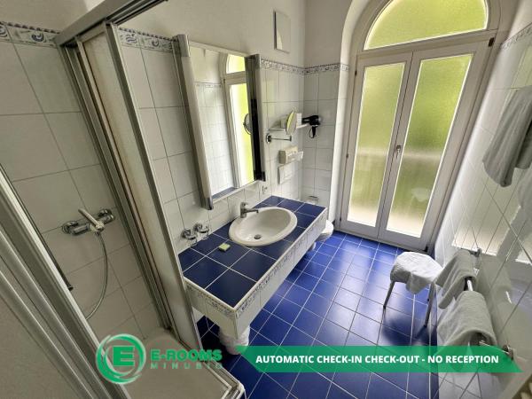 E-Rooms Minusio : photo 3 de la chambre chambre quadruple - vue sur lac