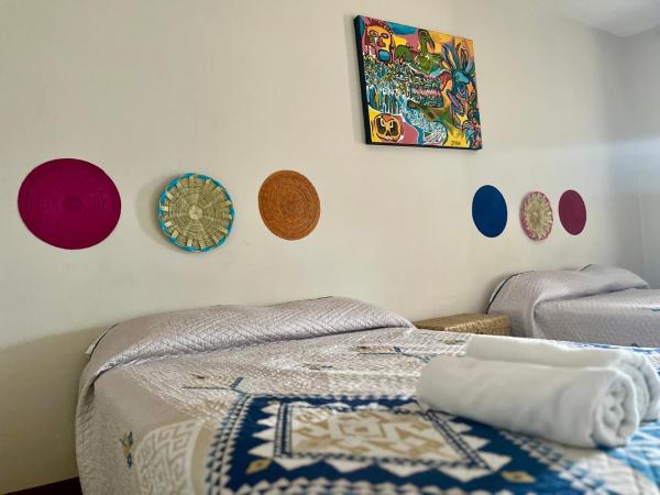 CASA CEMPOAL : photo 1 de la chambre chambre quadruple avec balcon