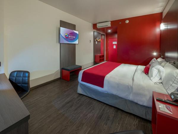 Ramada Encore by Wyndham Queretaro : photo 1 de la chambre chambre lit king-size