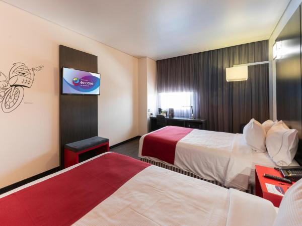 Ramada Encore by Wyndham Queretaro : photo 2 de la chambre chambre double avec 2 lits doubles