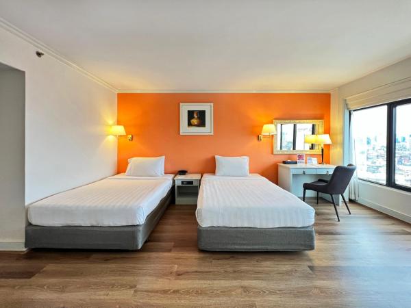 Grand China Bangkok : photo 2 de la chambre hébergement lits jumeaux deluxe - vue sur rivière