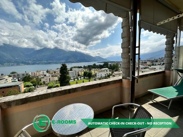 E-Rooms Minusio : photo 7 de la chambre chambre quadruple - vue sur lac