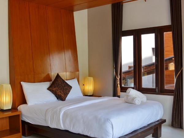 Lanta Intanin Resort - SHA Extra Plus : photo 7 de la chambre chambre double deluxe - vue sur jardin