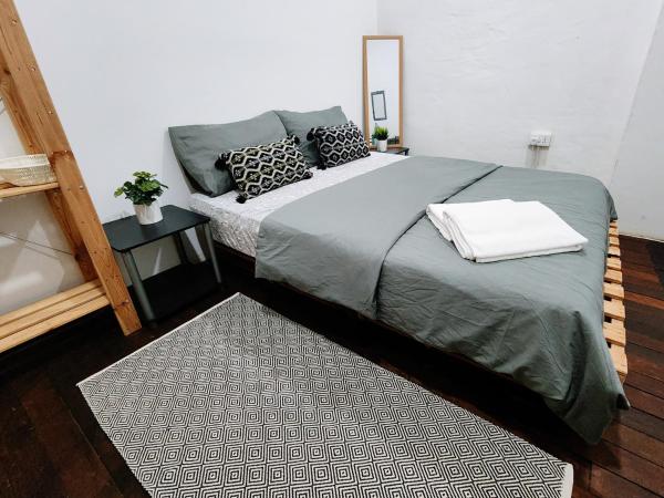 Upspot Kuching Waterfront Premium Hostel : photo 2 de la chambre chambre double Économique