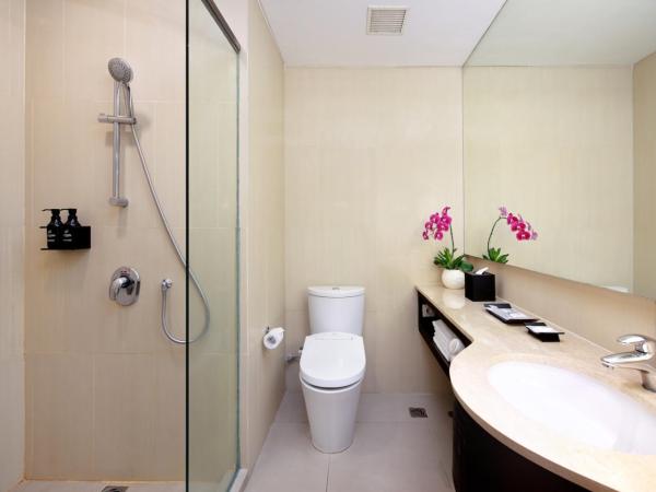 JS Luwansa Hotel & Convention Center : photo 1 de la chambre chambre deluxe double ou lits jumeaux