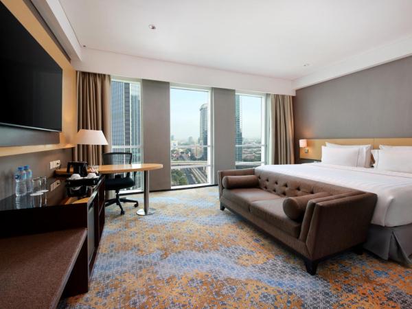 JS Luwansa Hotel & Convention Center : photo 3 de la chambre chambre lit king-size club