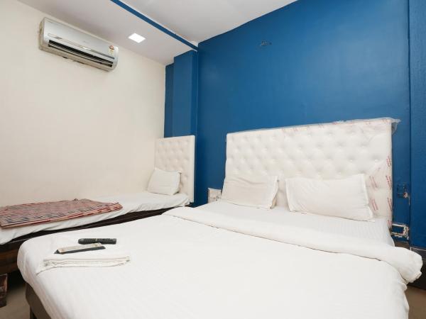 Hotel Om Residency : photo 7 de la chambre chambre familiale deluxe