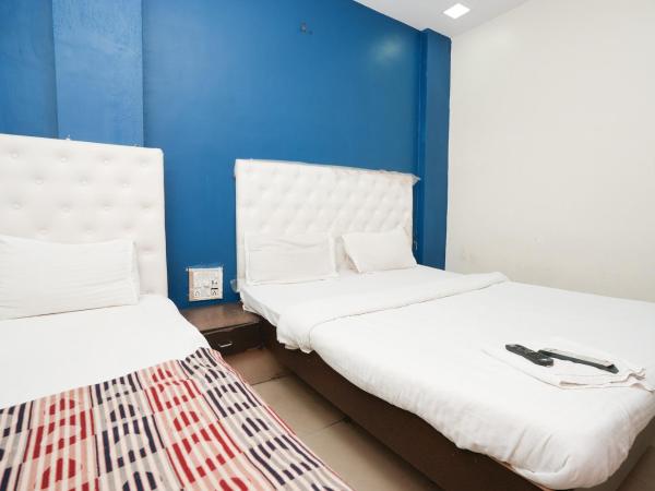 Hotel Om Residency : photo 3 de la chambre chambre familiale deluxe