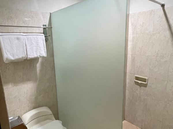 LPP Convention Hotel Demangan : photo 3 de la chambre chambre deluxe double ou lits jumeaux