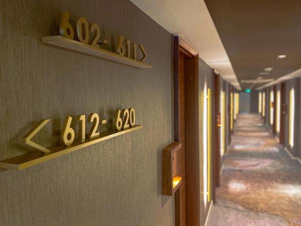 JS Luwansa Hotel & Convention Center : photo 4 de la chambre chambre deluxe double ou lits jumeaux