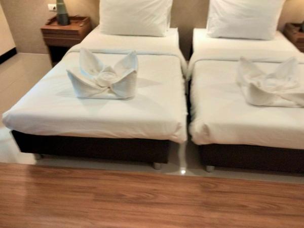 Kim Hotel At Morleng : photo 4 de la chambre chambre lits jumeaux supérieure