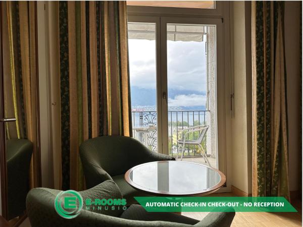 E-Rooms Minusio : photo 2 de la chambre chambre lits jumeaux - vue sur lac