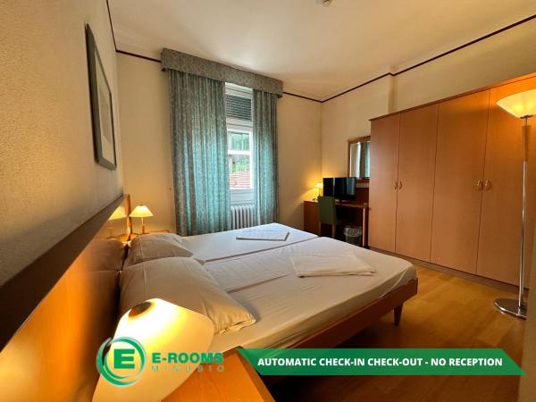 E-Rooms Minusio : photo 4 de la chambre chambre lits jumeaux