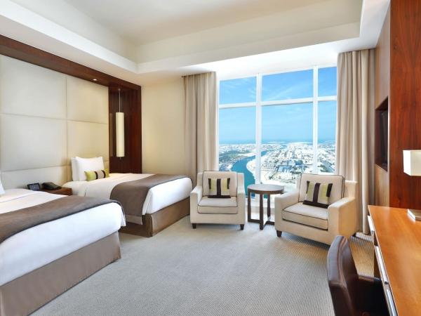 JW Marriott Marquis Hotel Dubai : photo 6 de la chambre chambre lits jumeaux deluxe - vue sur mer