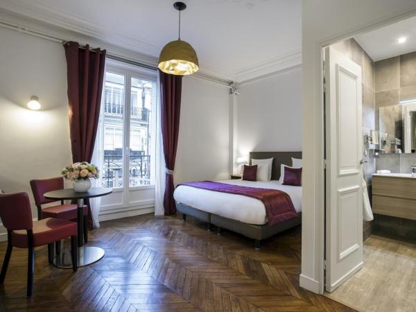 Vestay George V : photo 1 de la chambre suite lit king-size avec balcon