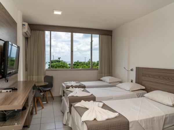 Hotel Praia Mar : photo 4 de la chambre chambre triple - vue partielle sur mer
