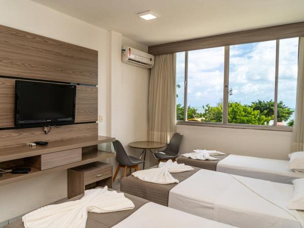 Hotel Praia Mar : photo 3 de la chambre chambre triple - vue partielle sur mer