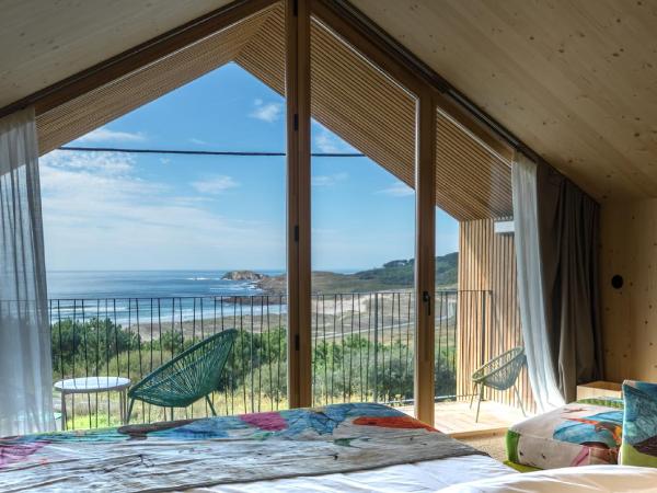 Doniños Nature : photo 10 de la chambre bungalow deluxe - vue sur mer