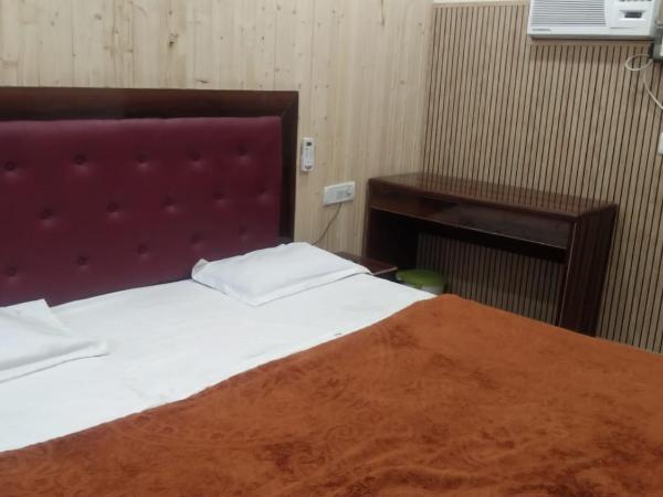 Hotel Host : photo 2 de la chambre chambre double deluxe (2 adultes + 1 enfant)