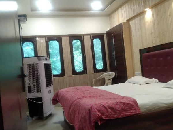 Hotel Host : photo 1 de la chambre chambre double deluxe (2 adultes + 1 enfant)