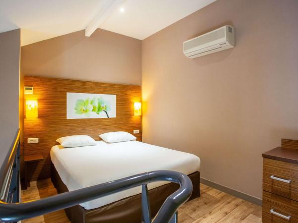 ibis Styles Bourges : photo 3 de la chambre chambre double privilège avec canapé