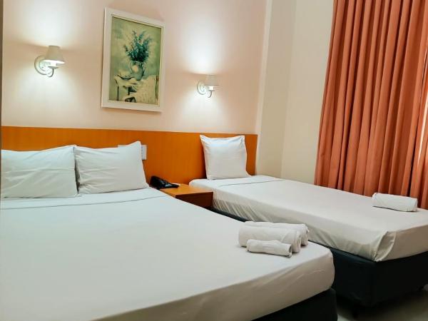 Hotel Atlântico Tower : photo 1 de la chambre chambre triple standard