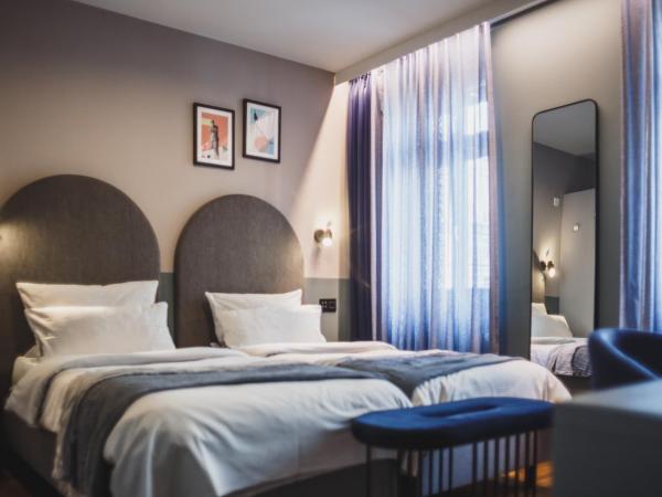 The Circus Hotel : photo 2 de la chambre hébergement moyen lits jumeaux - 2 personnes maximum