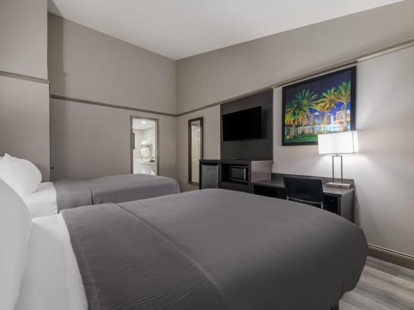 Quality Inn & Suites Altamonte Springs Orlando-North : photo 1 de la chambre chambre quadruple - fumeurs