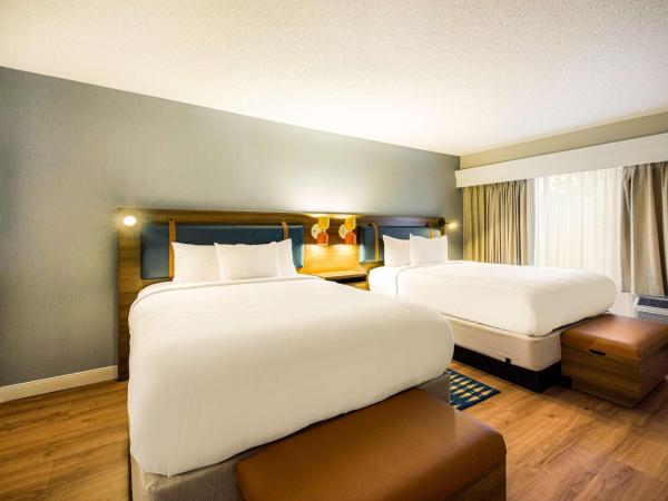 Sonesta Select Philadelphia Airport : photo 1 de la chambre chambre avec 2 lits queen-size