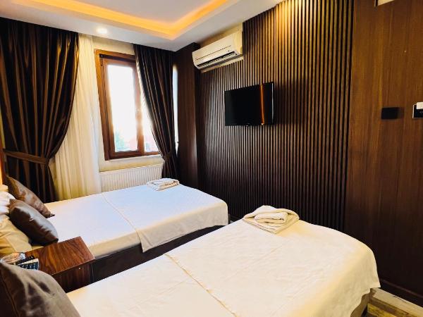 Liman Hotel : photo 3 de la chambre chambre triple deluxe