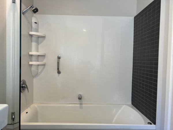 Quality Inn Acapulco Taupo : photo 8 de la chambre hébergement 2 chambres avec baignoire spa