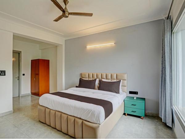 Roswell Inn : photo 4 de la chambre chambre lit king-size deluxe