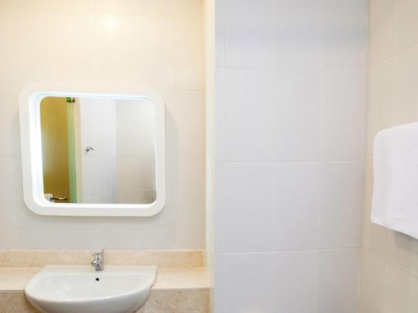 Zest Jemursari by Swiss-Belhotel International : photo 10 de la chambre chambre lits jumeaux - zest