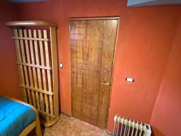 Hostel Ruca Potu : photo 4 de la chambre chambre triple avec salle de bains privative
