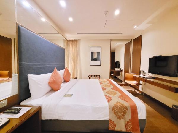 On 8 Sukhumvit Nana Bangkok by Compass Hospitality : photo 4 de la chambre chambre lit king-size deluxe amber 