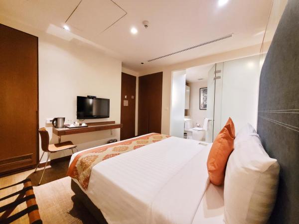 On 8 Sukhumvit Nana Bangkok by Compass Hospitality : photo 5 de la chambre chambre lit king-size deluxe amber 