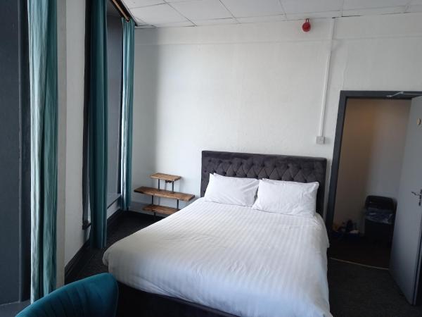 Vinnie's Family Hotel : photo 2 de la chambre chambre quadruple - vue sur mer