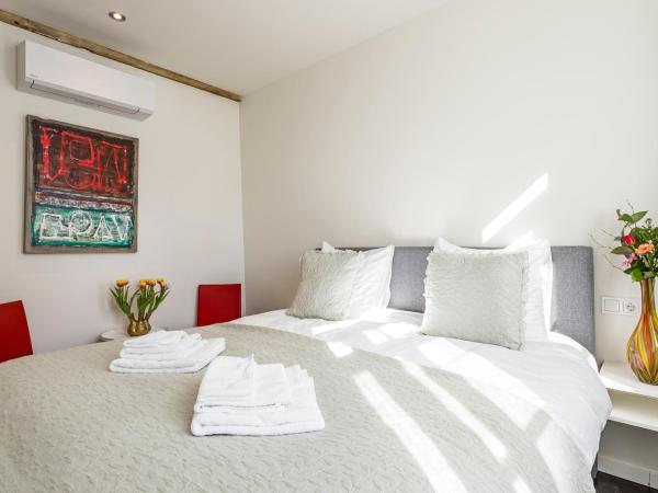 B&B Gracht 62 : photo 6 de la chambre suite deluxe avec lit king-size