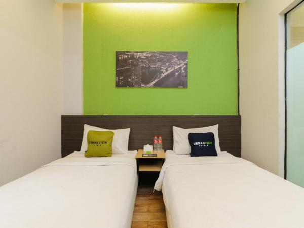 Urbanview Caverna Gandaria by RedDoorz : photo 4 de la chambre chambre lits jumeaux supérieure