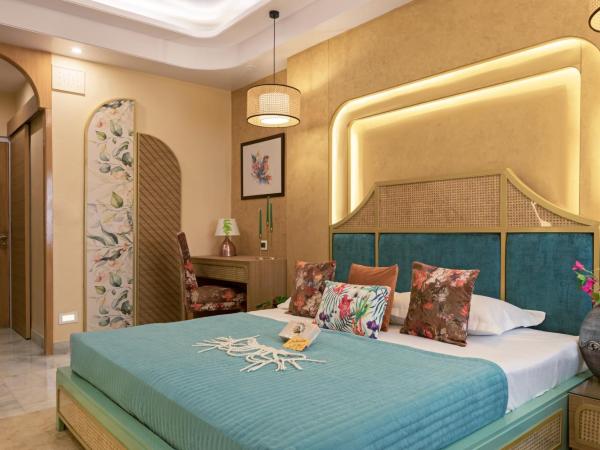 Hotel Sarang Palace - Boutique Stays : photo 2 de la chambre bohemian theme room with artistic rattan décor and designer washroom