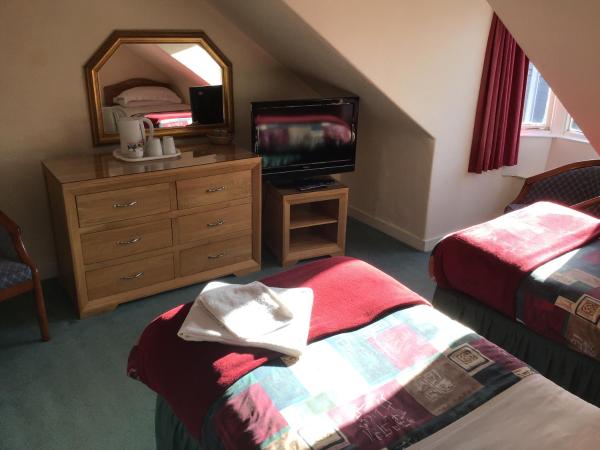 The Royal Crown Guest House : photo 6 de la chambre chambre lits jumeaux standard avec salle de bains commune