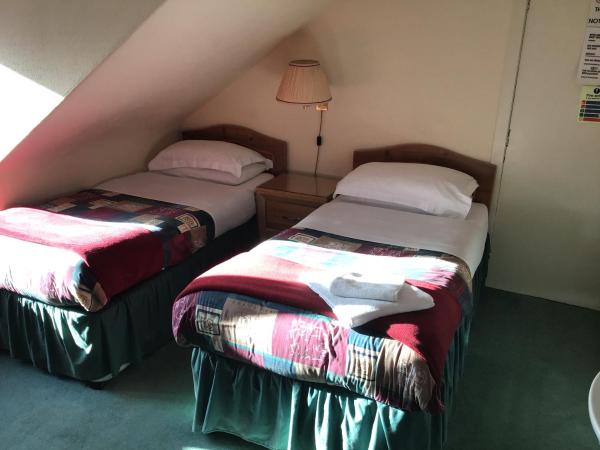The Royal Crown Guest House : photo 5 de la chambre chambre lits jumeaux standard avec salle de bains commune
