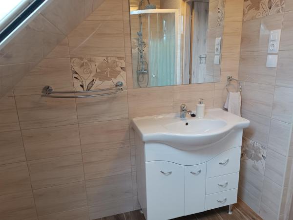 Holt-Tisza Vendégház : photo 2 de la chambre chambre triple