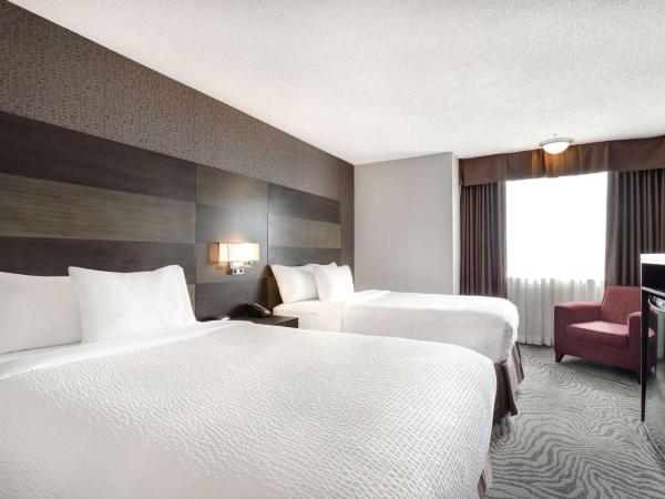 Days Inn by Wyndham Calgary South : photo 1 de la chambre chambre double avec 2 lits doubles - non-fumeurs
