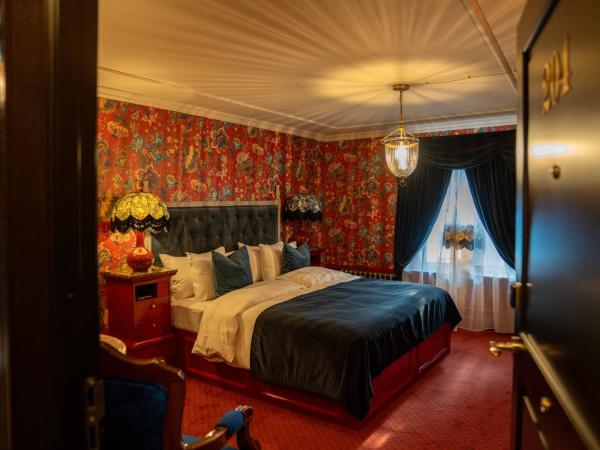 Charmante - Skostredet Hôtel : photo 10 de la chambre grande chambre noble