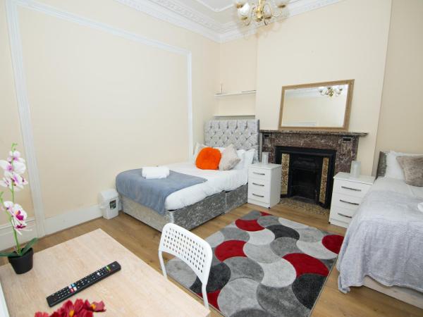 Victorian Woods BnB : photo 7 de la chambre chambre familiale avec salle de bains commune