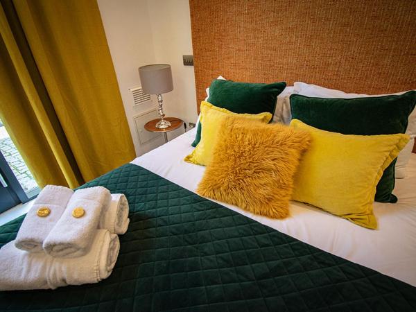 Beachcliff Rooms & Apartments : photo 10 de la chambre chambre double - vue sur jardin