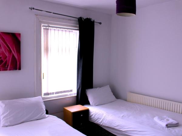 Henson Hotel Pleasure Beach : photo 1 de la chambre chambre lits jumeaux standard