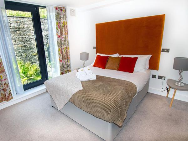 Beachcliff Rooms & Apartments : photo 9 de la chambre chambre double - vue sur jardin